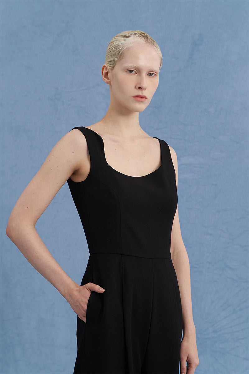 ASYMMETRIC-BECK SLEEVELESS JUMPSUIT IN BLACK