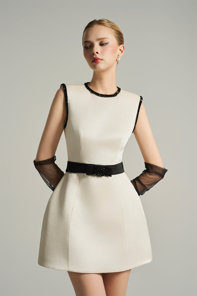 SLEEVELESS BELL MINI DRESS IN IVORY