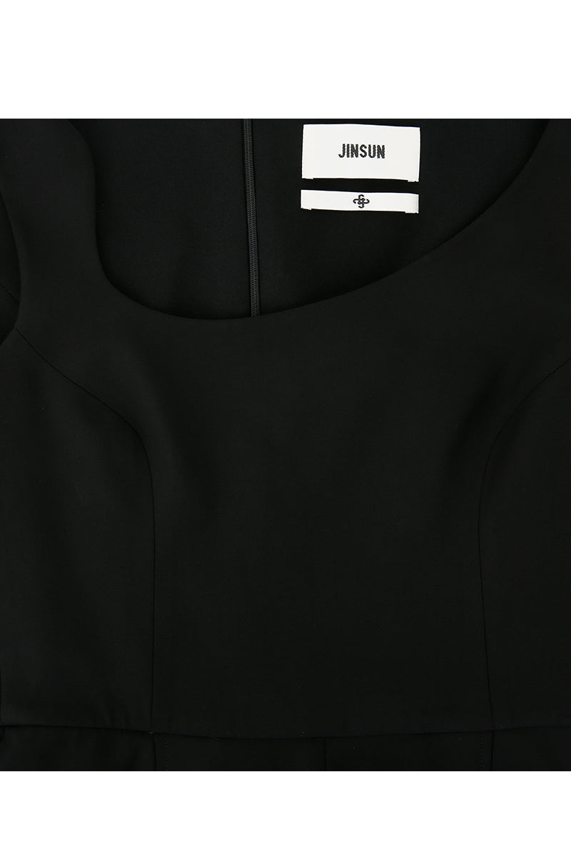 ASYMMETRIC-BECK SLEEVELESS JUMPSUIT IN BLACK